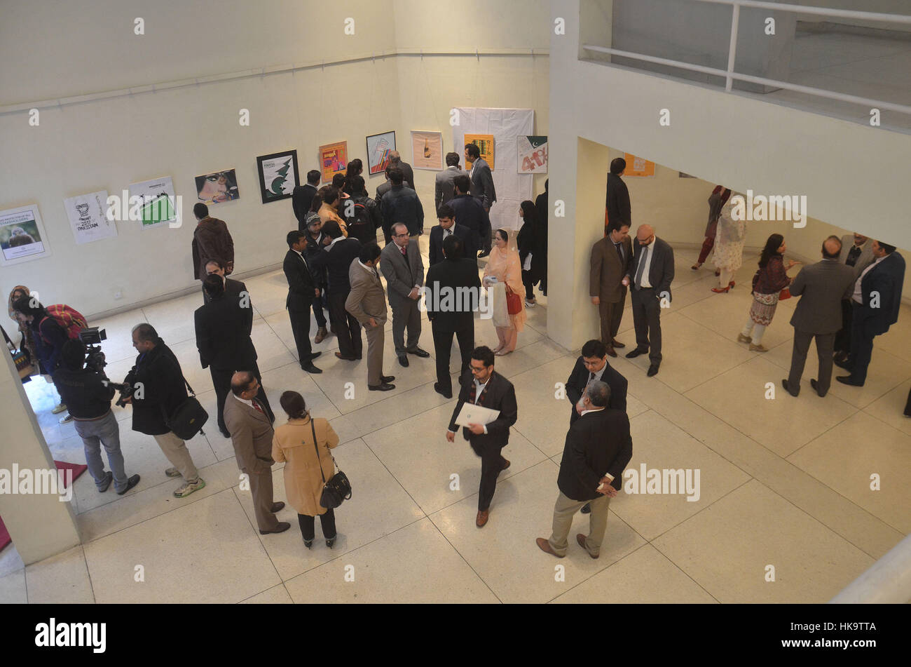 Lahore, Pakistan. 26th Jan, 2017. Pakistani people and student takes a part of poster exhibition at alhamra hall. The day is celebrated on January 26 every year under the World Customs Organization slogan. Credit: Rana Sajid Hussain/Pacific Press/Alamy Live News Stock Photo