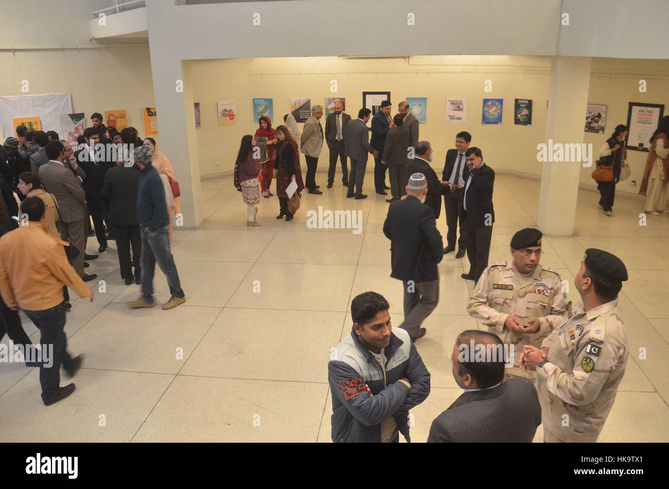 Lahore, Pakistan. 26th Jan, 2017. Pakistani people and student takes a part of poster exhibition at alhamra hall. The day is celebrated on January 26 every year under the World Customs Organization slogan. Credit: Rana Sajid Hussain/Pacific Press/Alamy Live News Stock Photo