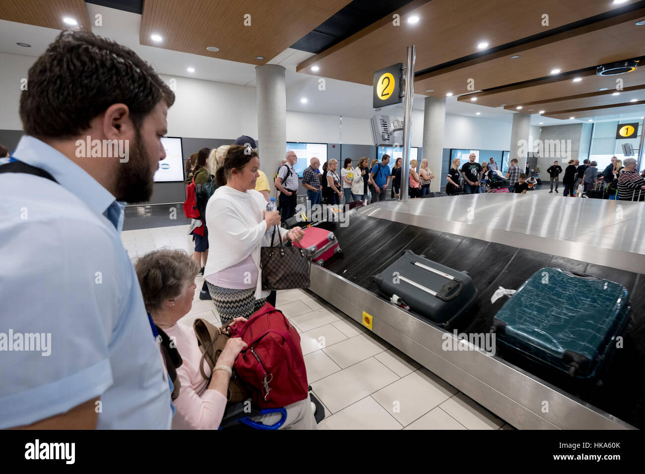 Passengers waiting for their luggage at Larnaca airport, Cyprus. Stock Photo