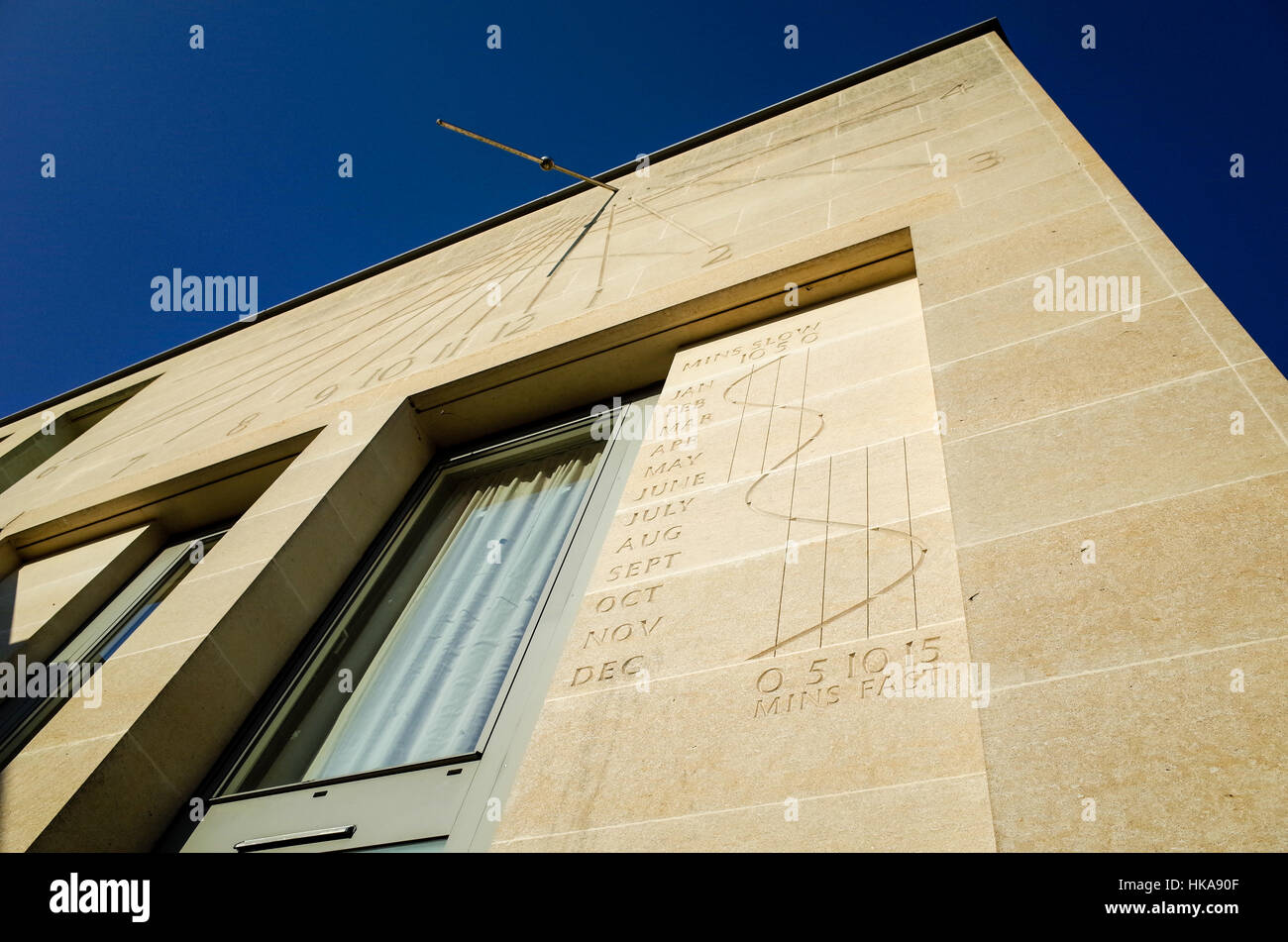 Sundial on a modern building, Pembroke College, University of Cambridge Stock Photo