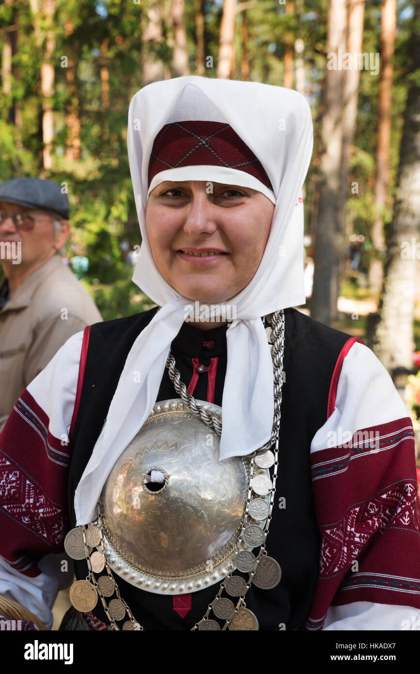 Portrait of an married woman of Seto people in traditional dress with silver breastplate Suur Solg , Obinitsa, Estonia Stock Photo