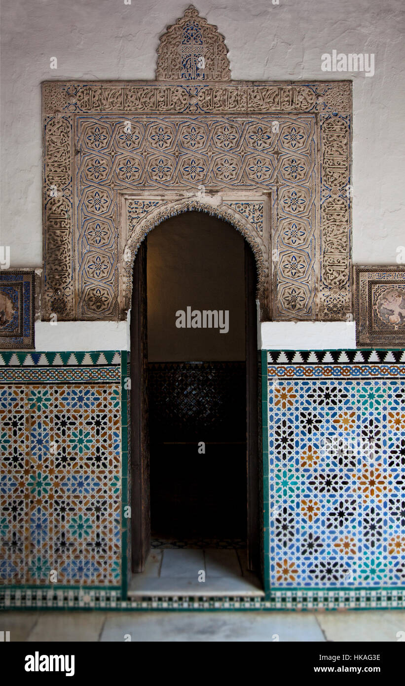 A tiled and relief patterned doorway in the Alcazar in Seville, Andalucia Stock Photo