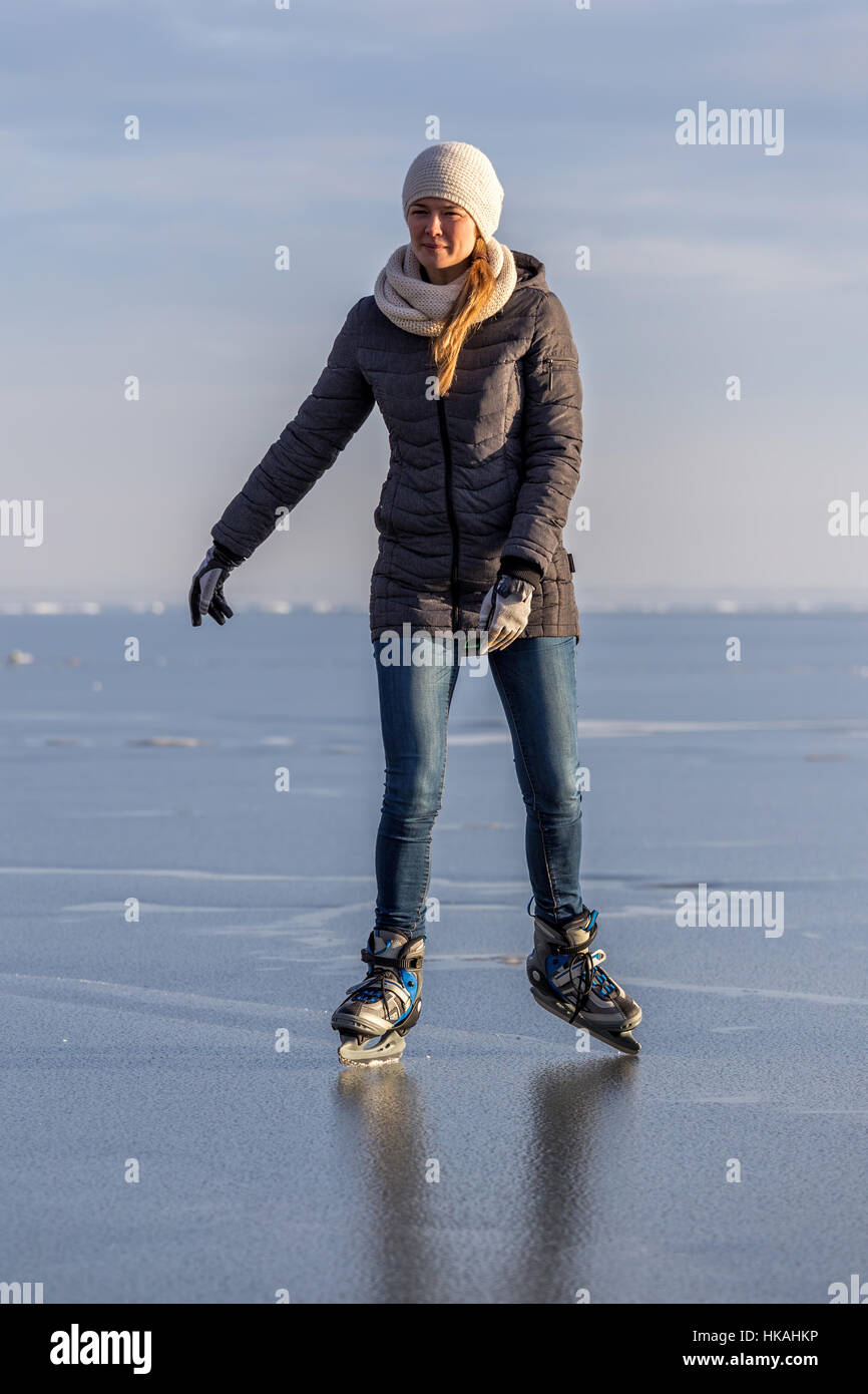 Young girl skating on Lake Balaton in Hungary Stock Photo