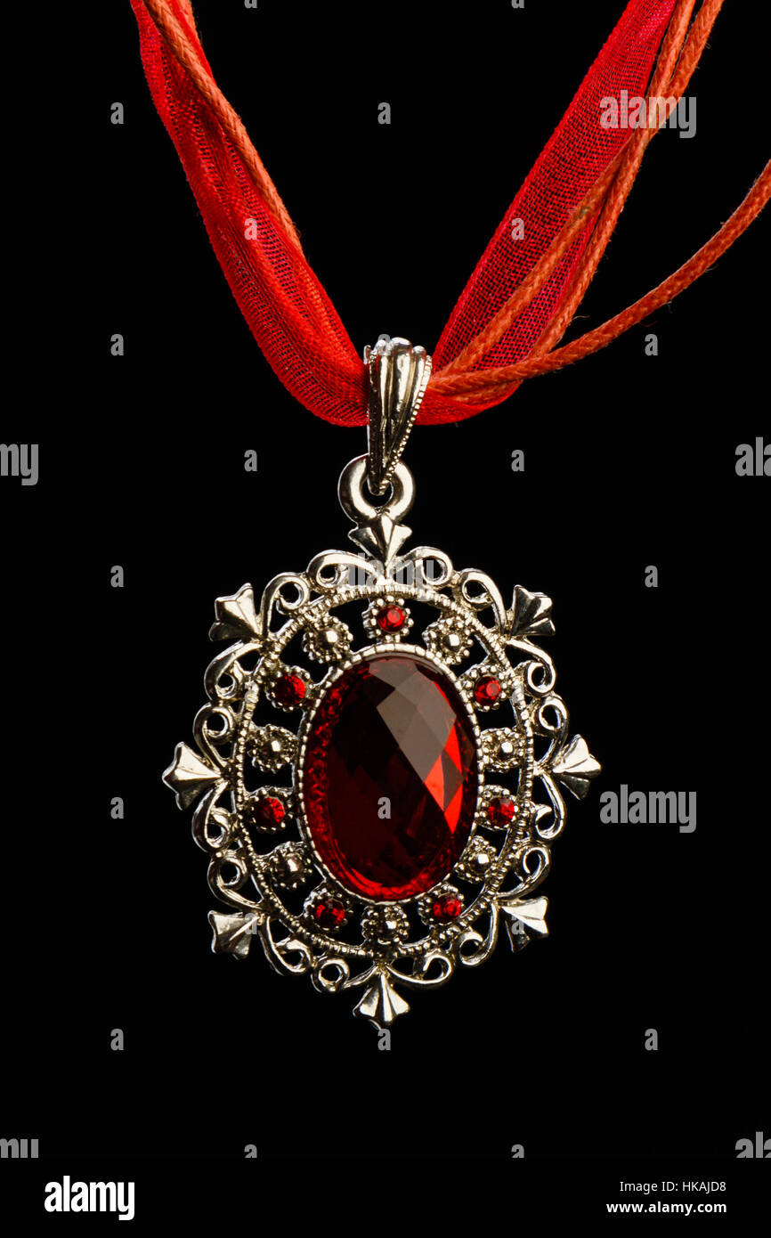 artistic jewelry necklace with pendant on black background Stock Photo