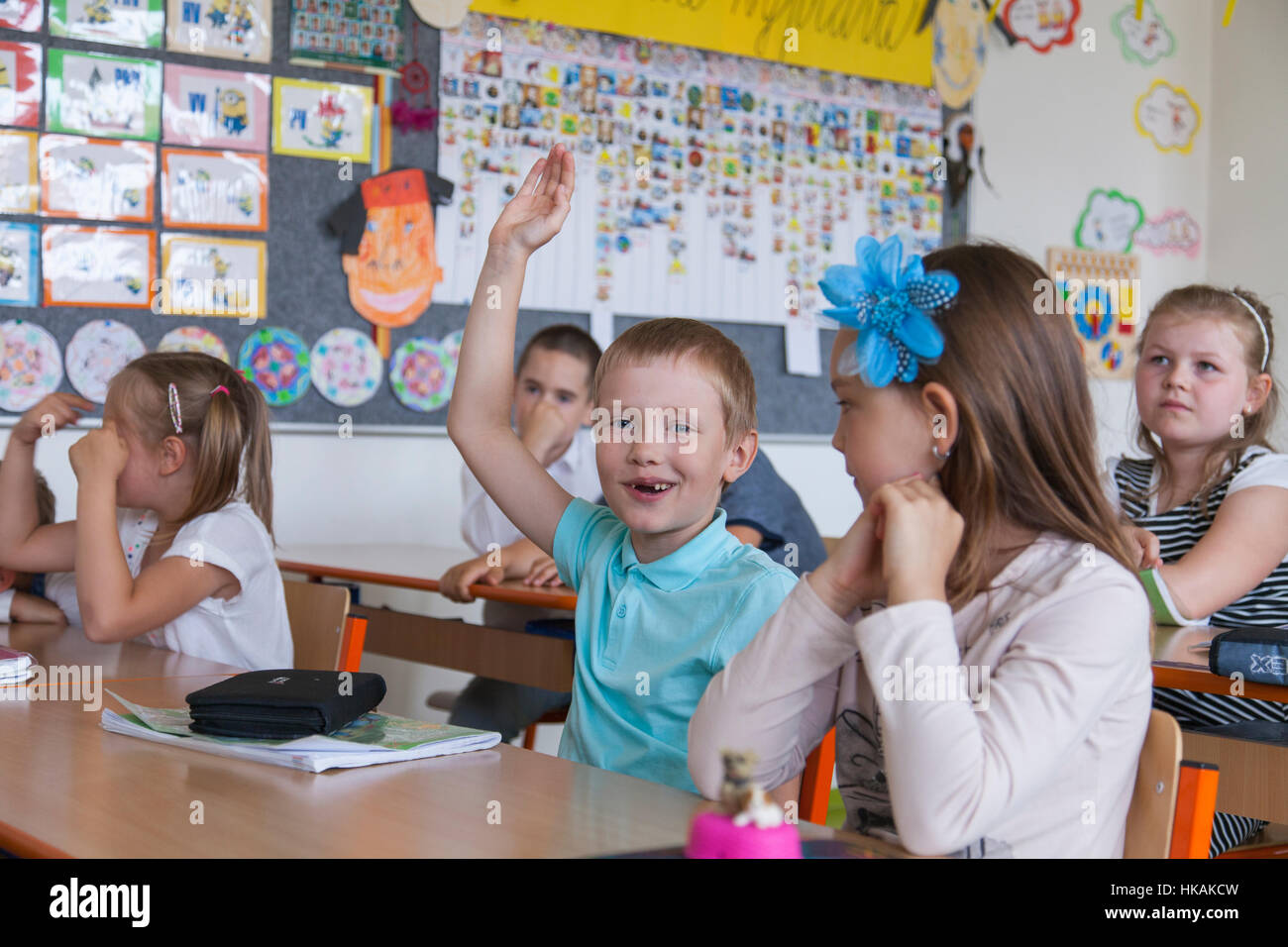 Boy raises hand hi-res stock photography and images - Alamy