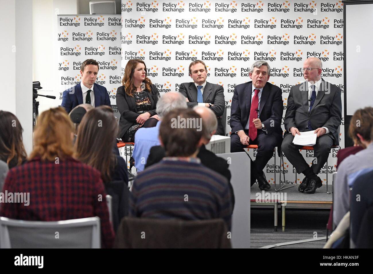 (left to right) Professor John Bew, Alison McGovern MP, Tom Tugendhat MP, former Prime Minister Gordon Brown and Director of the Policy Exchange Dean Godson at the launch of a new bipartisan report titled The Cost of Doing Nothing, co-authored by the late Jo Cox MP, at the Policy Exchange in Westminster, London. Stock Photo