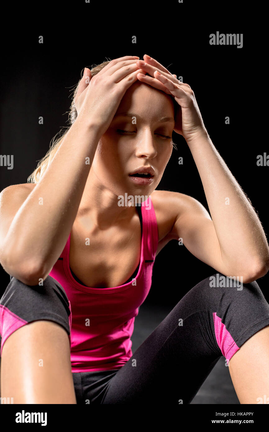 Tired sportive woman Stock Photo