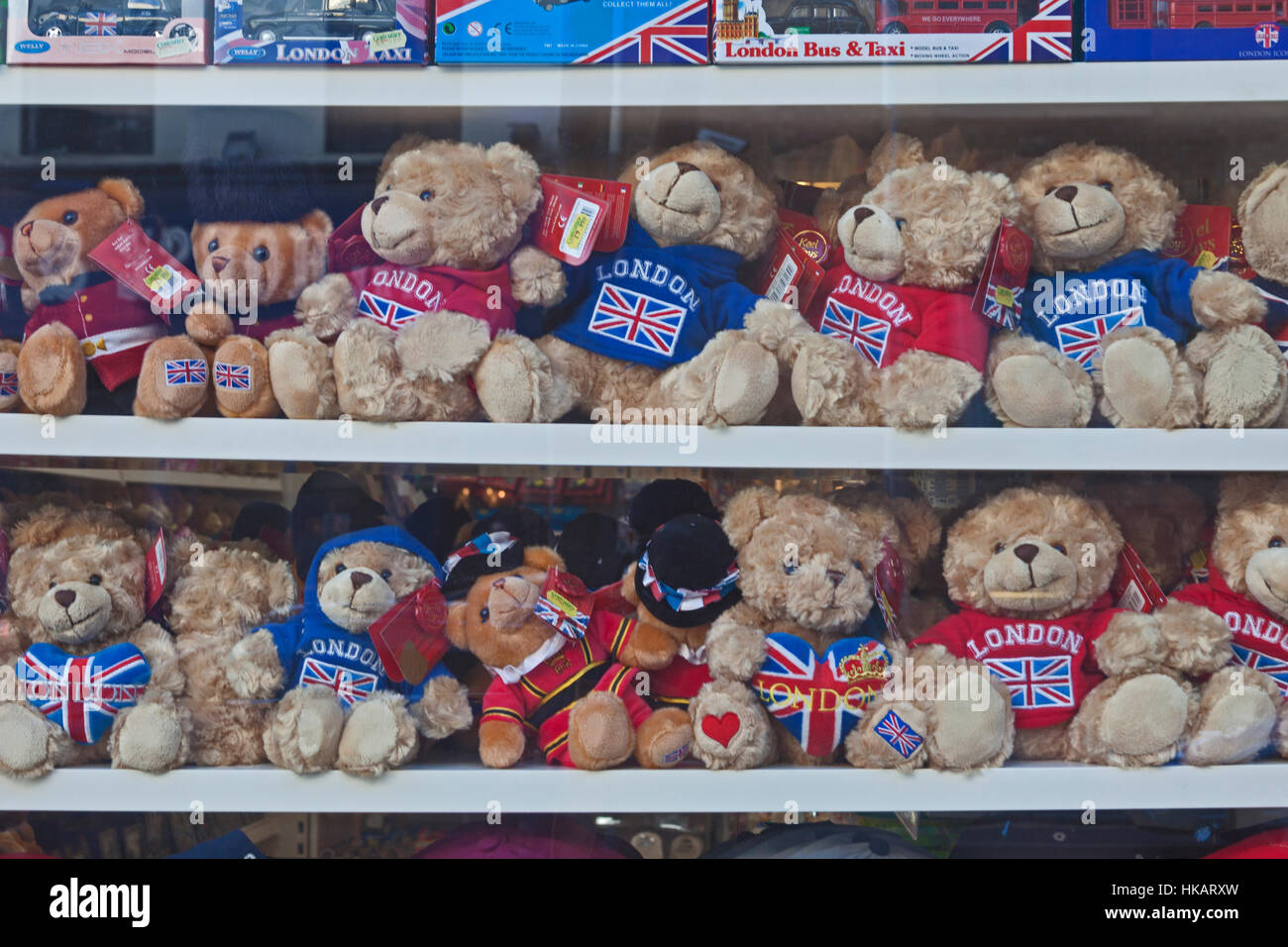 London, Southwark A display of miniature teddy bears in a shop window ...