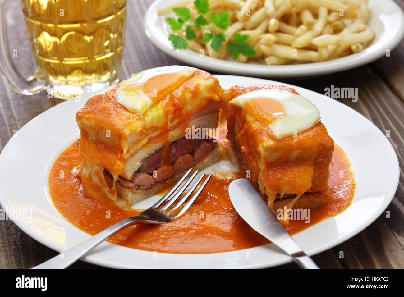 homemade francesinha, portuguese sandwich and french fries ...