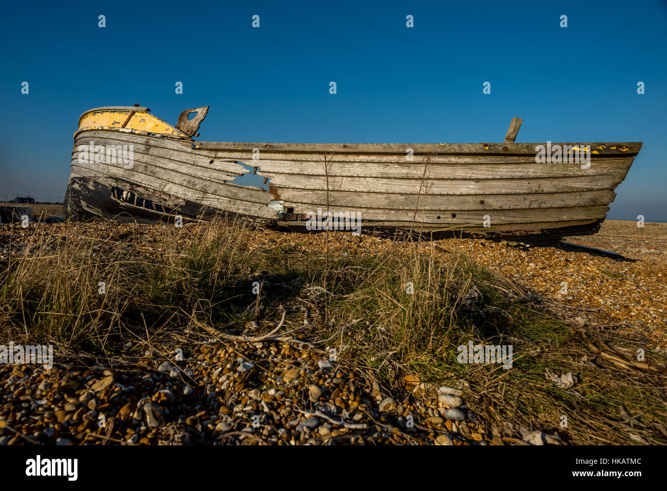 Derelict fishing boat on shingle beach hi-res stock photography and ...