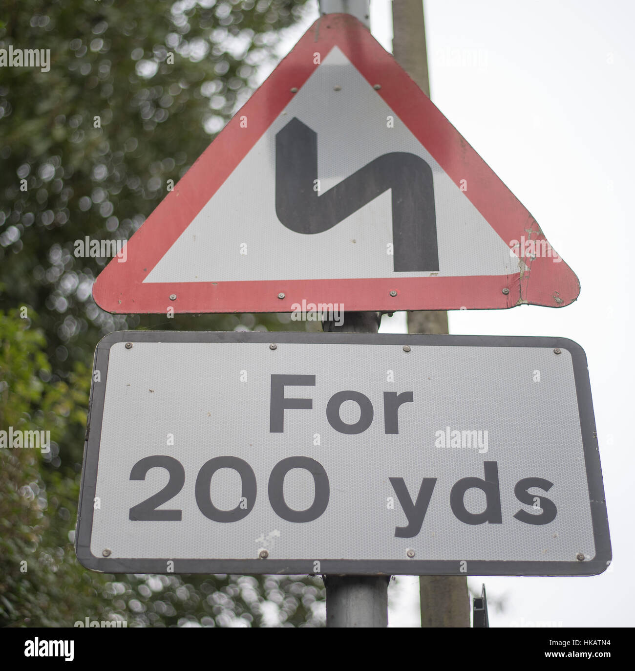 Bends in road, UK urban road sign Stock Photo