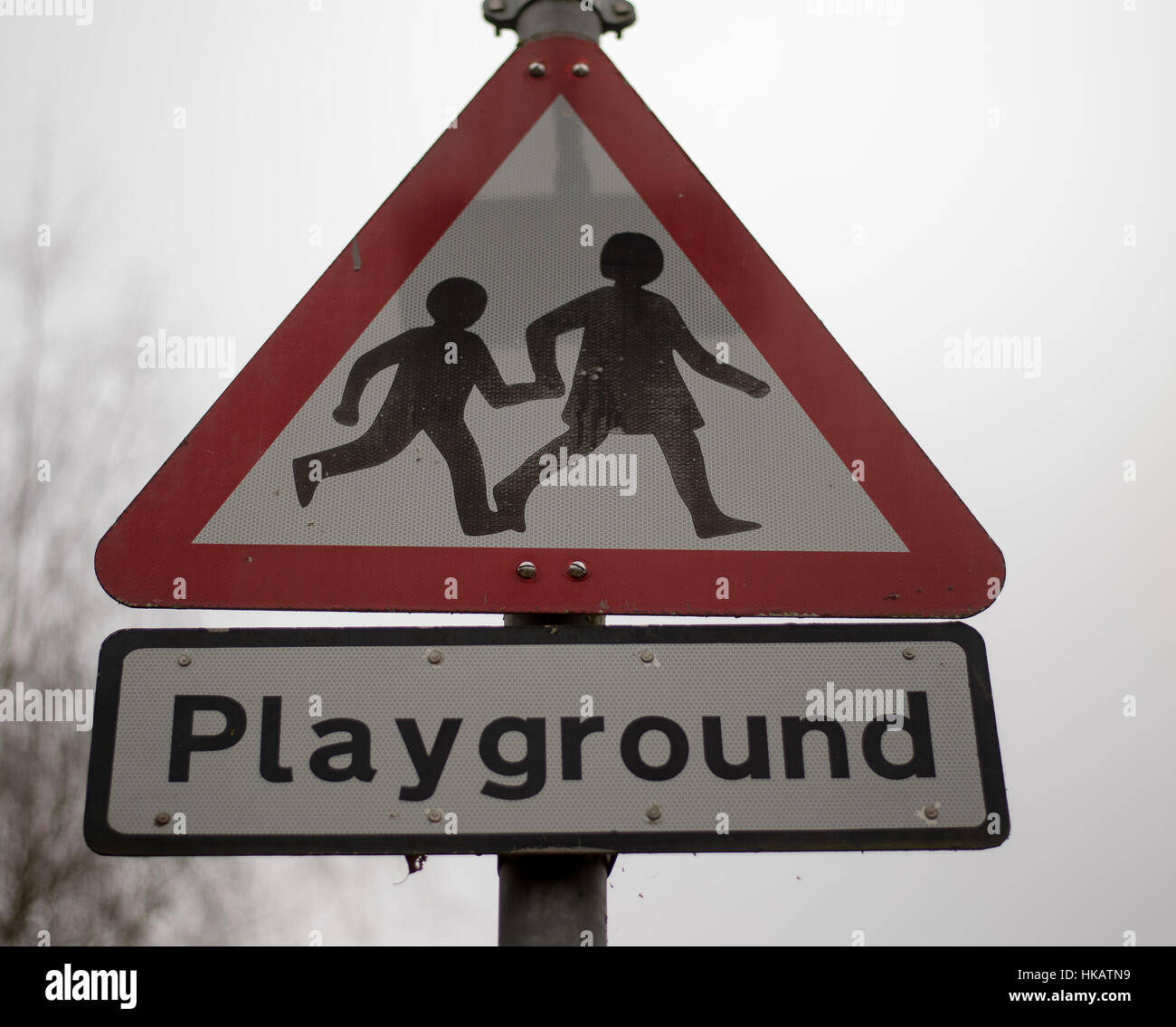 Triangular Playground warning sign  UK urban road sign Stock Photo