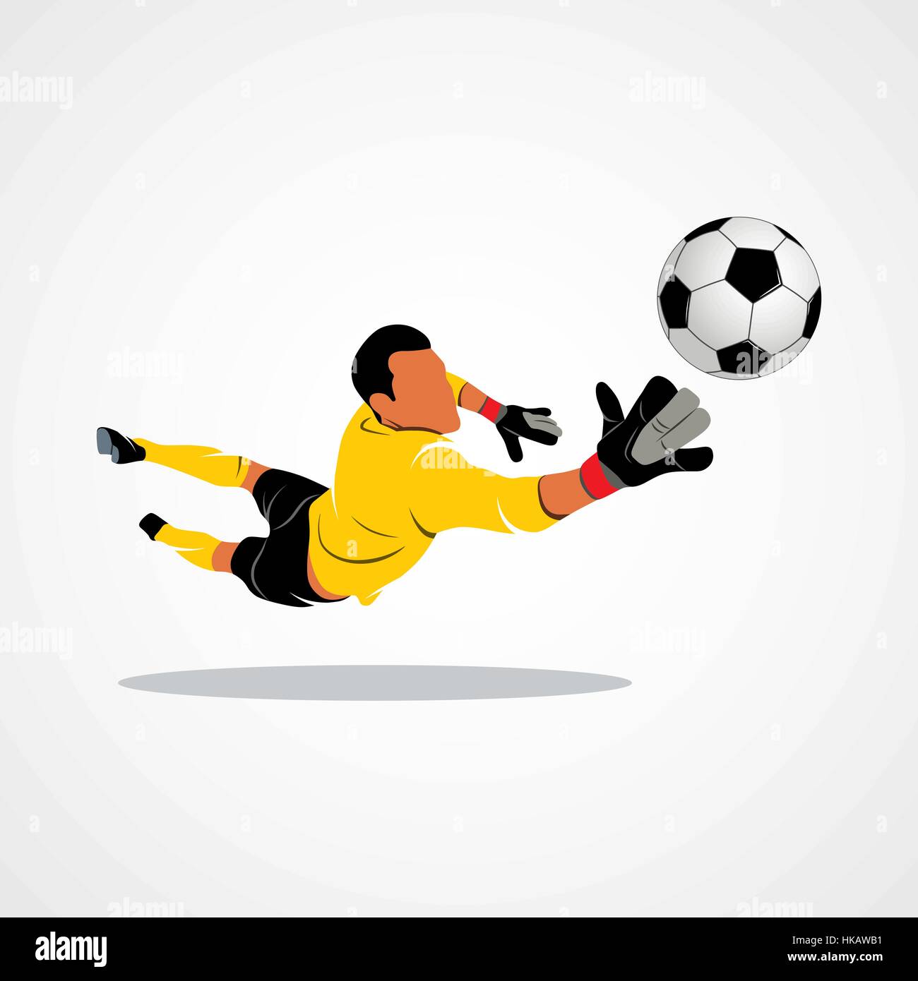 Football goalkeeper is jumping for the ball Soccer on a white