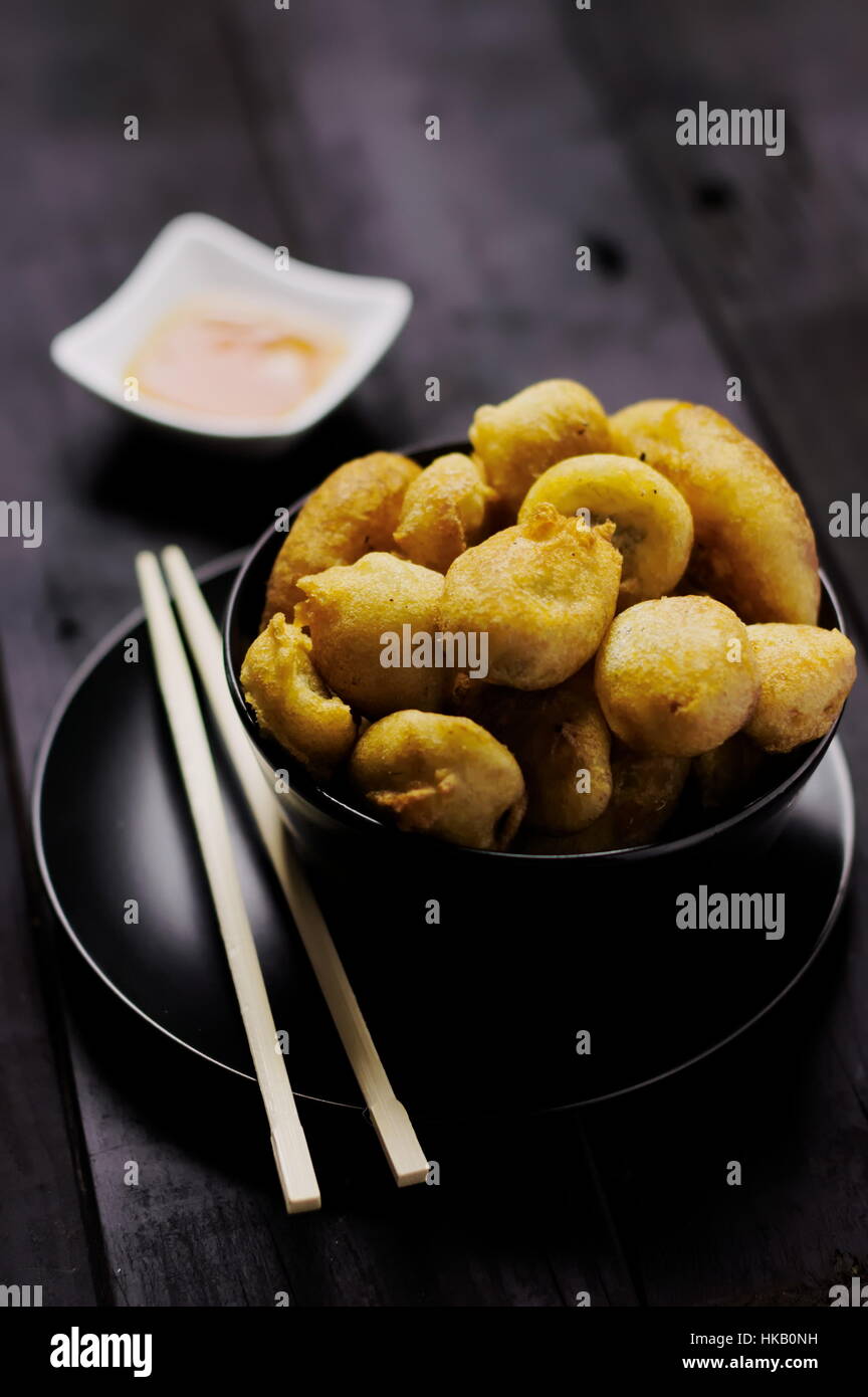 Chinese toffee bananas golden brown deep fried with caramel dipping