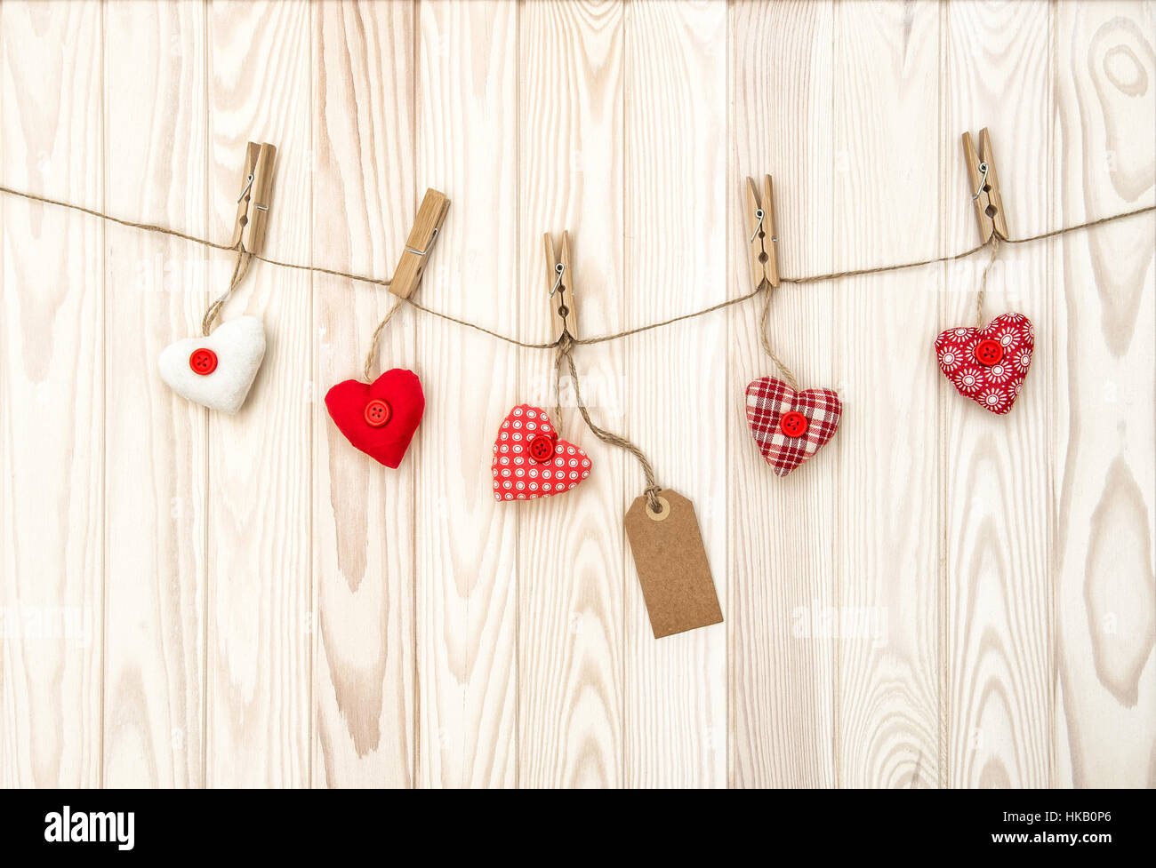 Red hearts on wooden texture. Valentines day background Stock Photo - Alamy