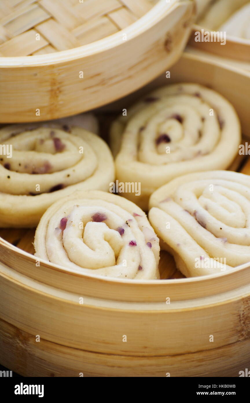 Homemade chinese steamed bread buns Mantou with red onions, sesame oil