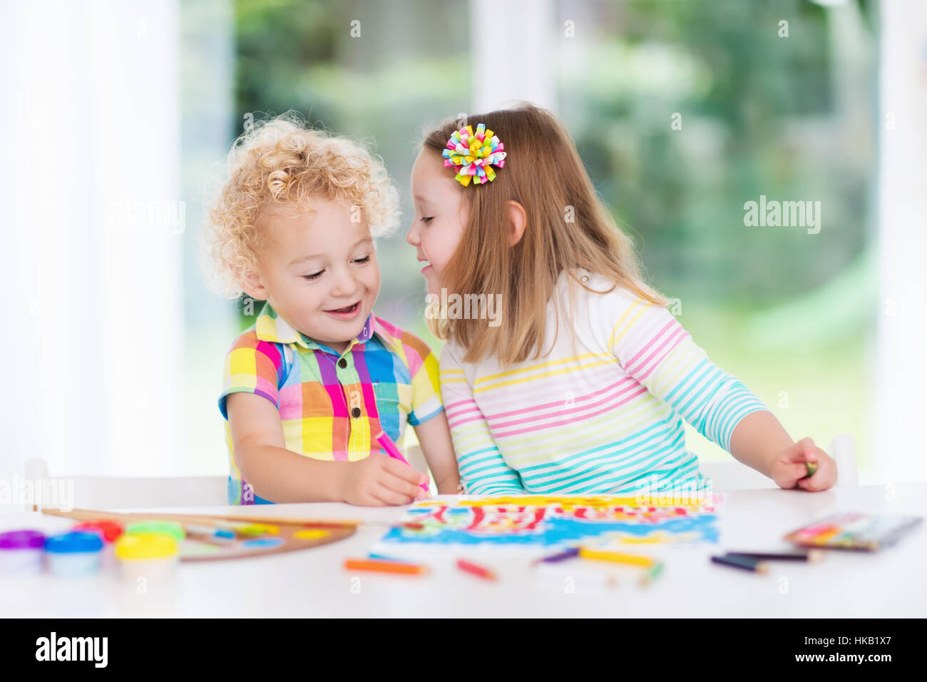 Little Boy And Girl Draw Together In White Room With Window Kids Doing Homework Painting And Drawing Children Paint Stock Photo Alamy Little Boy And Girl Draw Together In White Room With Window Kids Doing Homework Painting And Drawing Children Paint Stock Photo Alamy