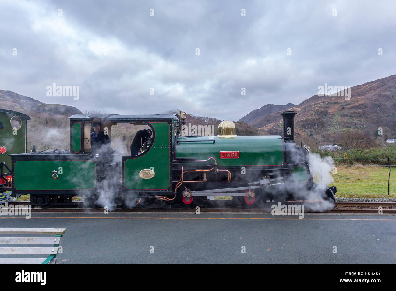 Narrow gauge steam locomotive stands at Beddgelert Station on the Welsh Highland Railway Stock Photo