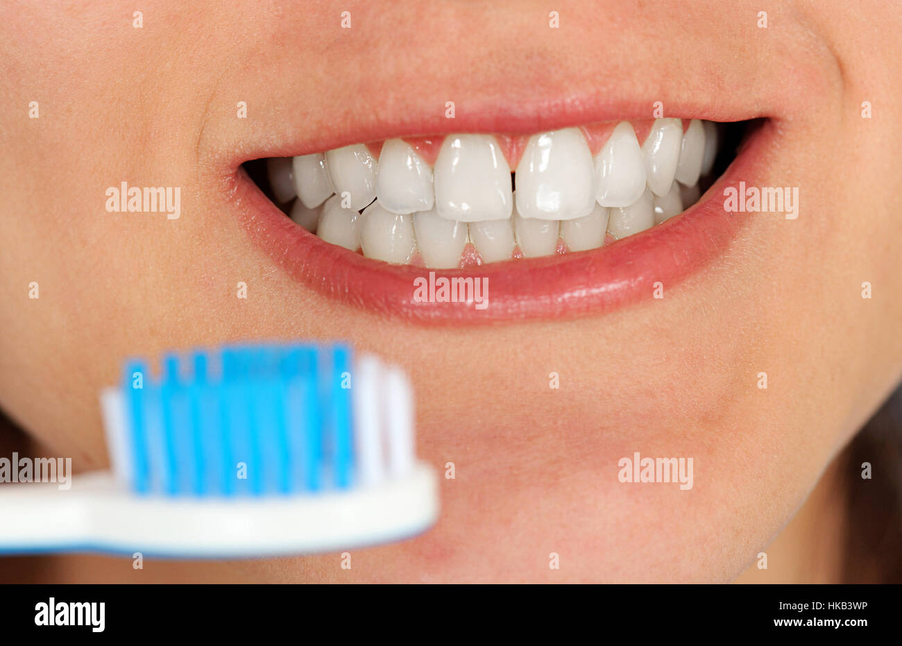 Brushing teeth after eating Stock Photo Alamy