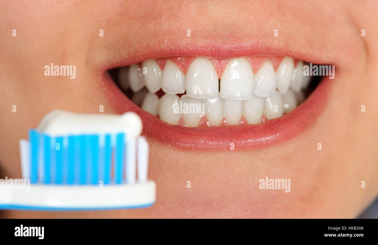 Brushing teeth after eating Stock Photo Alamy