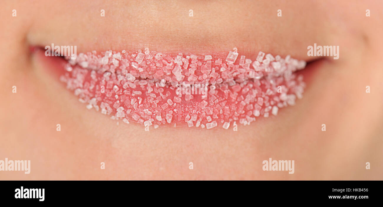 Sugar on girls lips Stock Photo