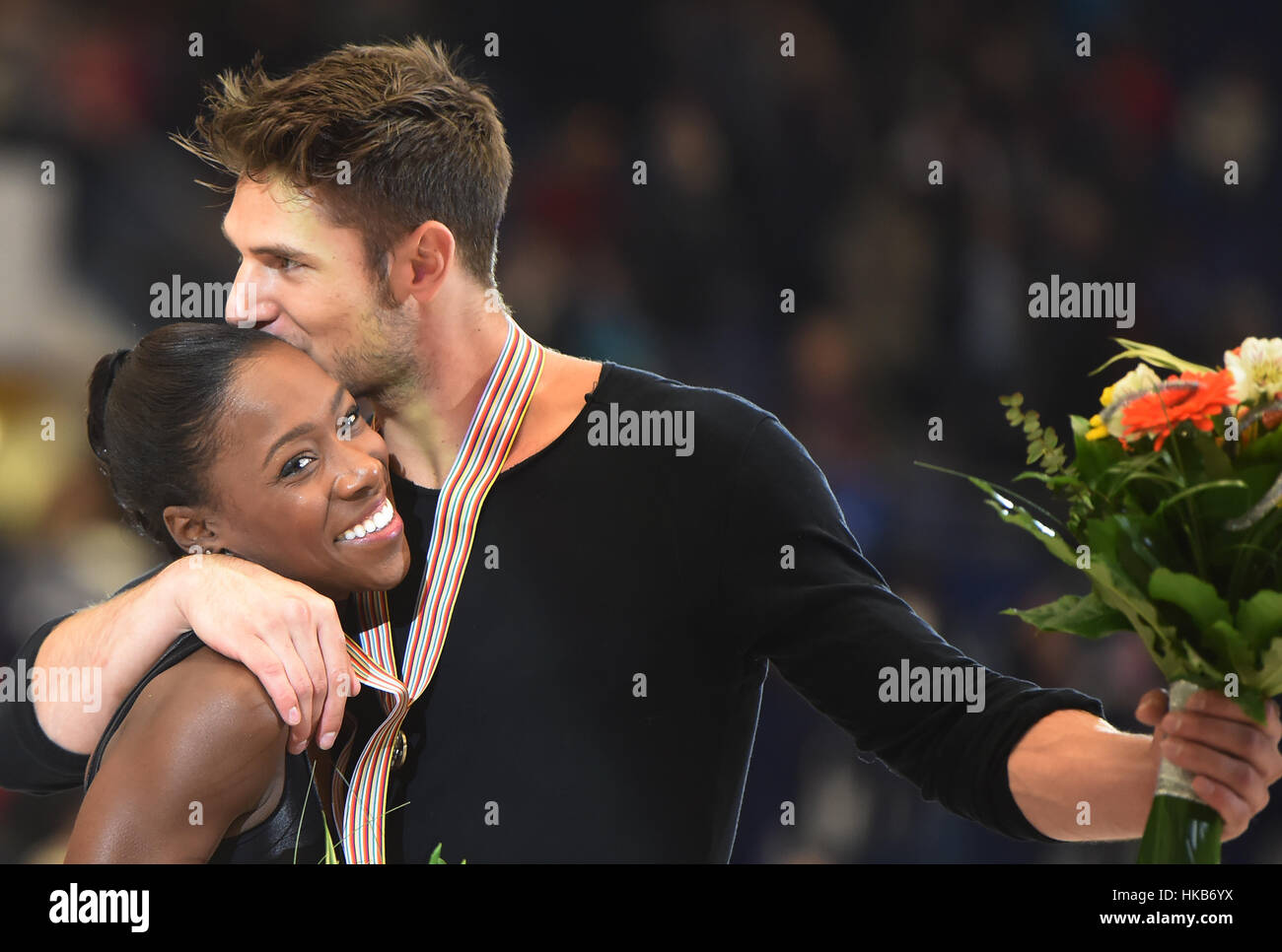 The third placed Vanessa James and Morgan Cipres of France pose after the p...