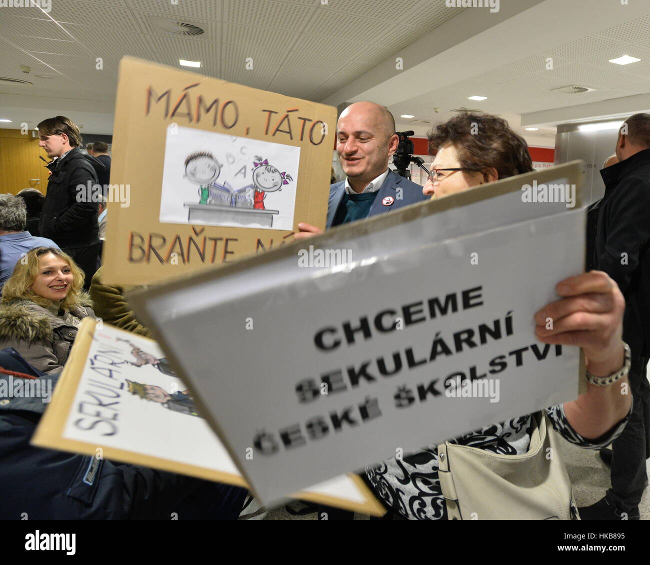 Martin Konvicka, chairman of the Bloc against Islam, attends Czech court which dismissed today a Somali female student's demand that a Prague secondary medical school apologise to her and provide financial compensation of 60,000 crowns for allegedly having banned the wearing of hijab. The girl, who was granted Czech asylum in 2011, said the hijab ban indirectly discriminated against her in her access to education and a free choice of profession. 'It was important to check whether the plaintiff met the conditions for becoming a student, which would entitle her to raise her claim based on the an Stock Photo