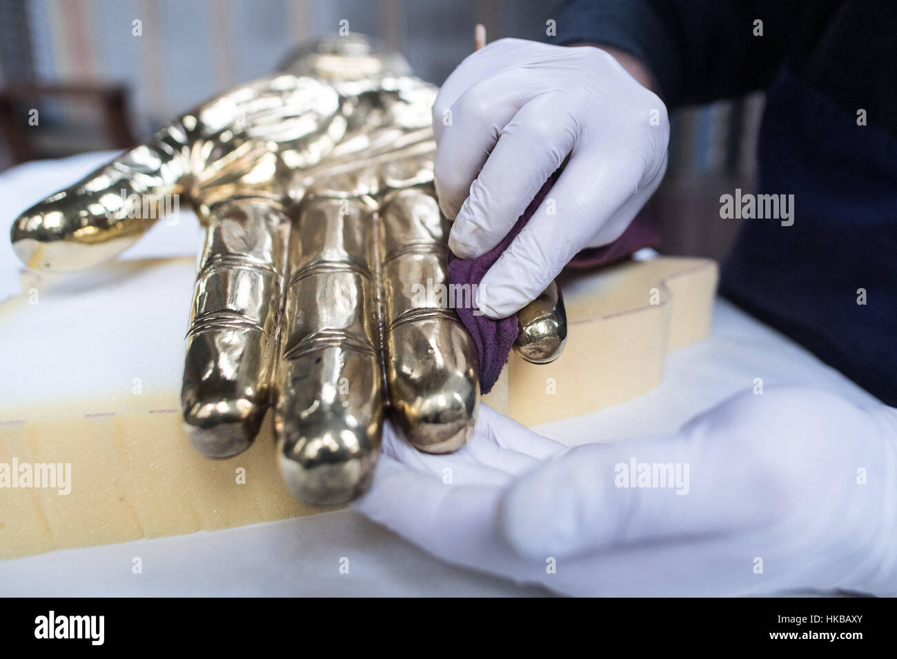 Aachen, Germany. 27th Jan, 2017. Silver smith Lothar Schmitt cleans the