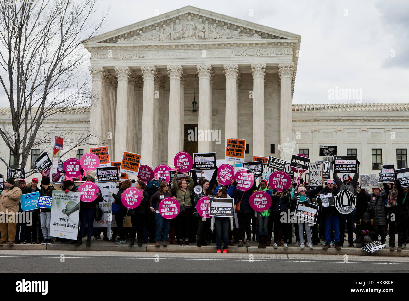 Washington, DC, USA. 27th January, 2017.Thousands of pro-life activists march from the National Mall to the Supreme Court building for the annual Pro-Life March.  Many pro-choice activists also gather in front of the Supreme Court, where both sides protest side by side. Credit: B Christopher/Alamy Live News Stock Photo