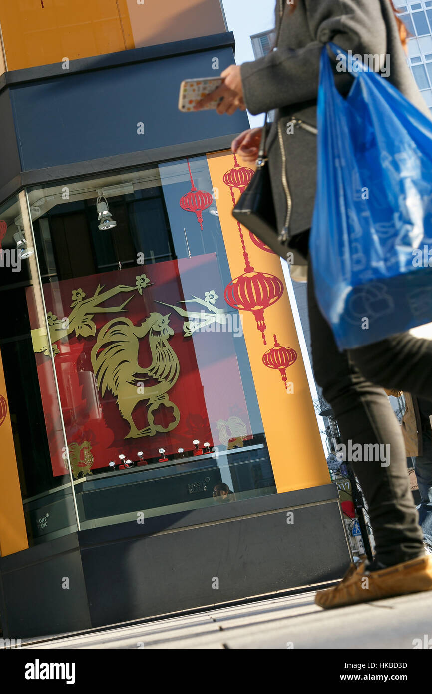 Asian tourists shopping during the Lunar New Year Holiday in the