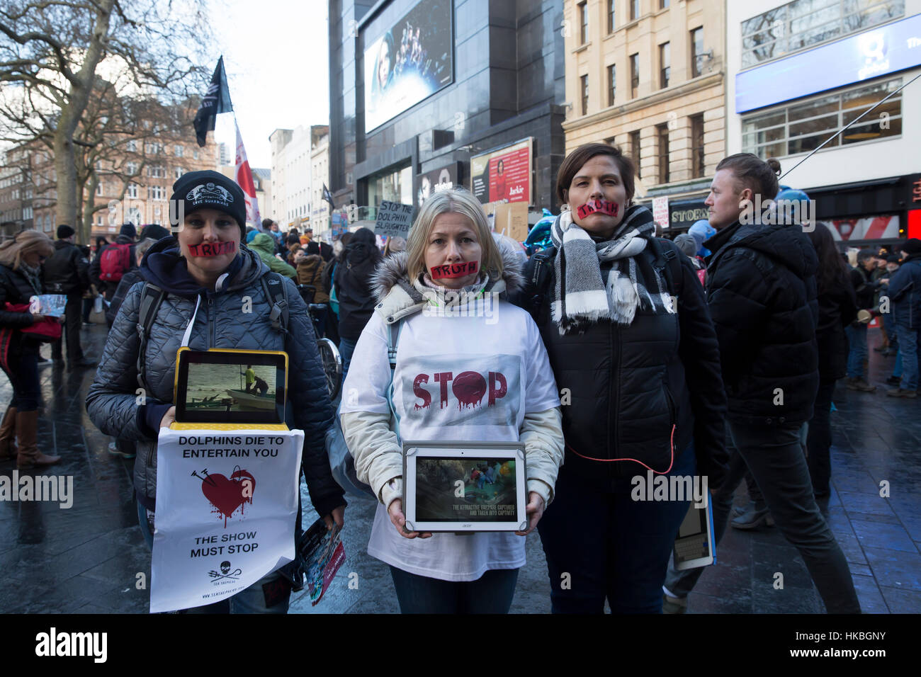 Leicester Square, UK. 28th Jan, 2017. Light up Taiji- stop the Dolphin slaughter and end captivity demonstration in Leicester Square London Credit: Keith Larby/Alamy Live News Stock Photo