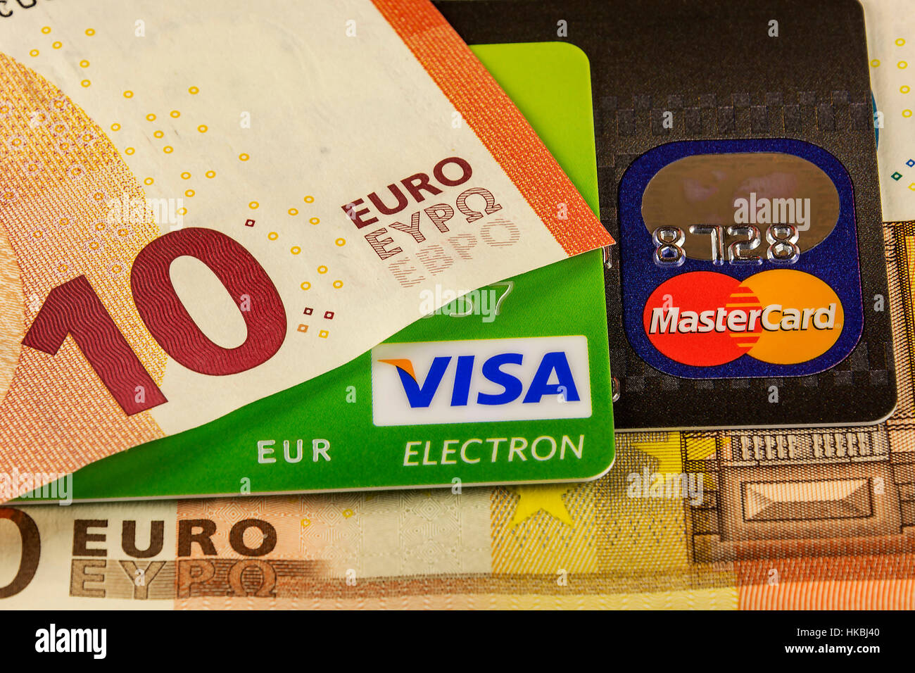 Part of the bank card cashless payment systems Visa and Master Card and parts of the euro banknotes Stock Photo
