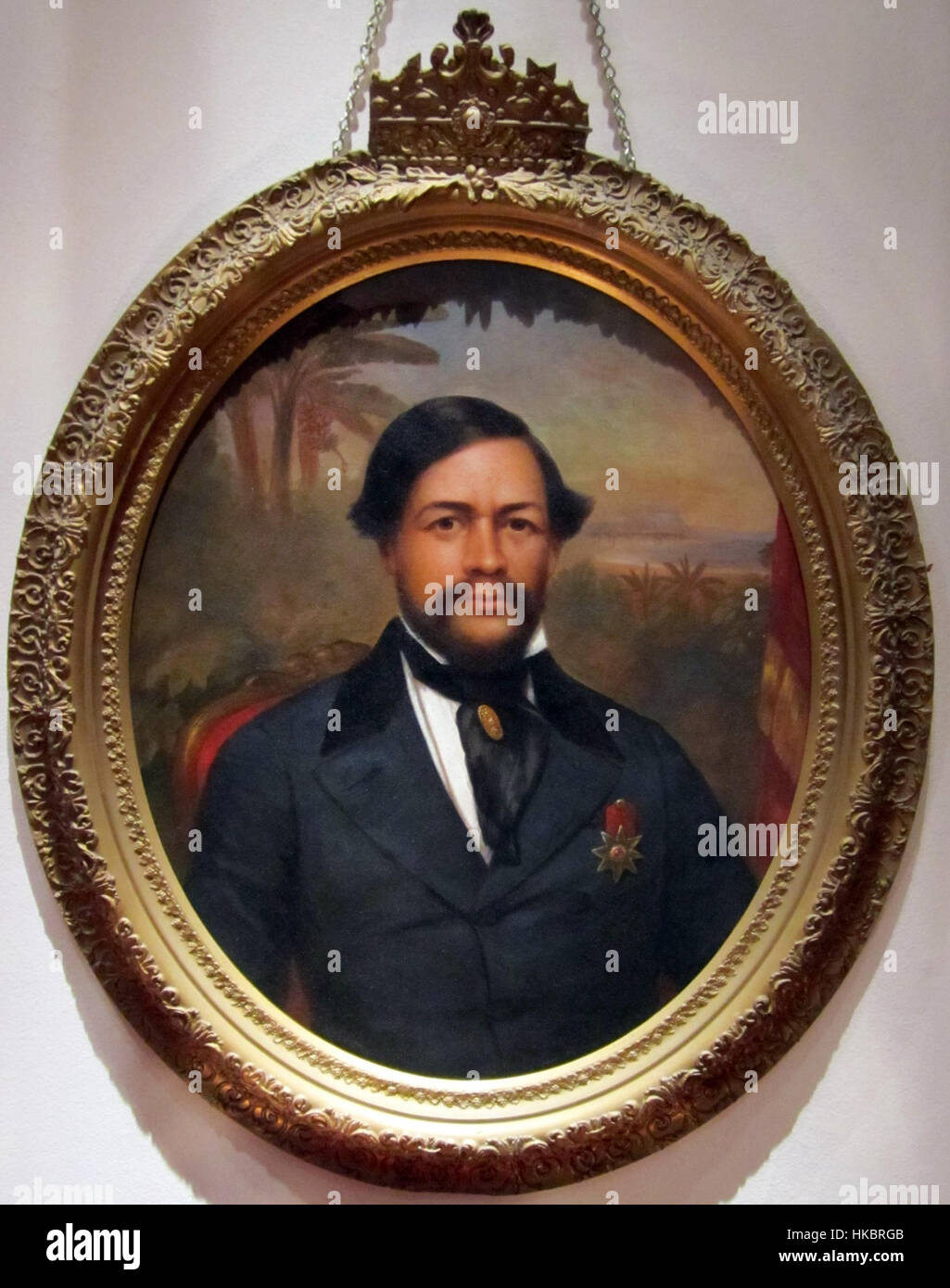 The portrait of King Kamehameha III, created by an unknown artist, is housed in the Kahili Room of the Bishop Museum. It captures the Hawaiian monarch who played a significant role in the establishment of the Kingdom of Hawaii. Stock Photo