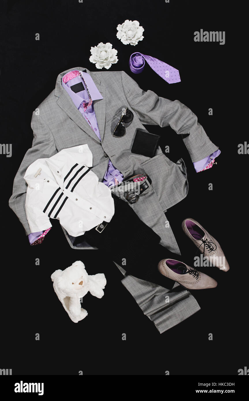 Composition of gray costume and  shoes with violet shirt and tie Stock Photo