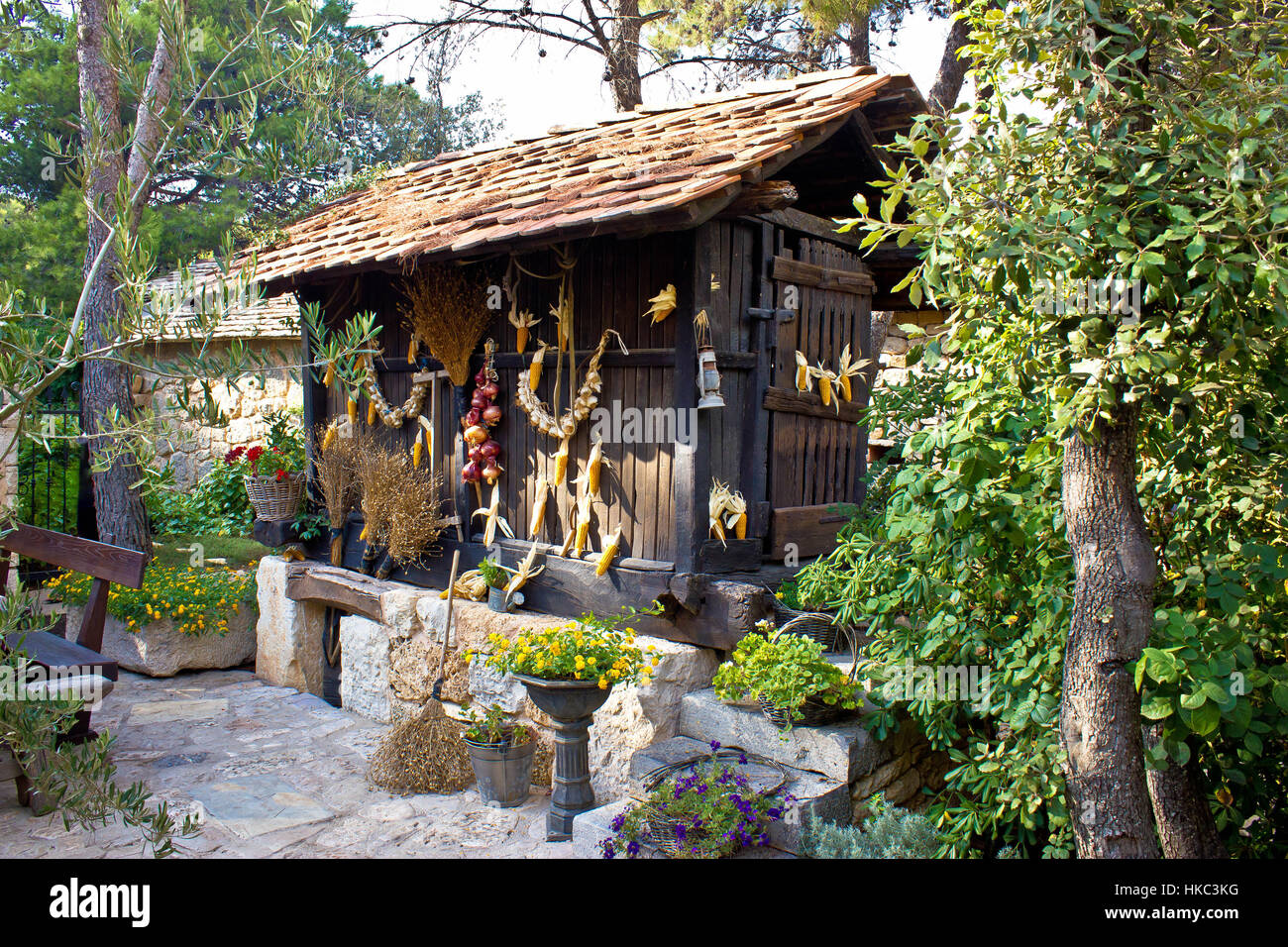 Traditional wooden corn drier store with ornaments, Croatia Stock Photo