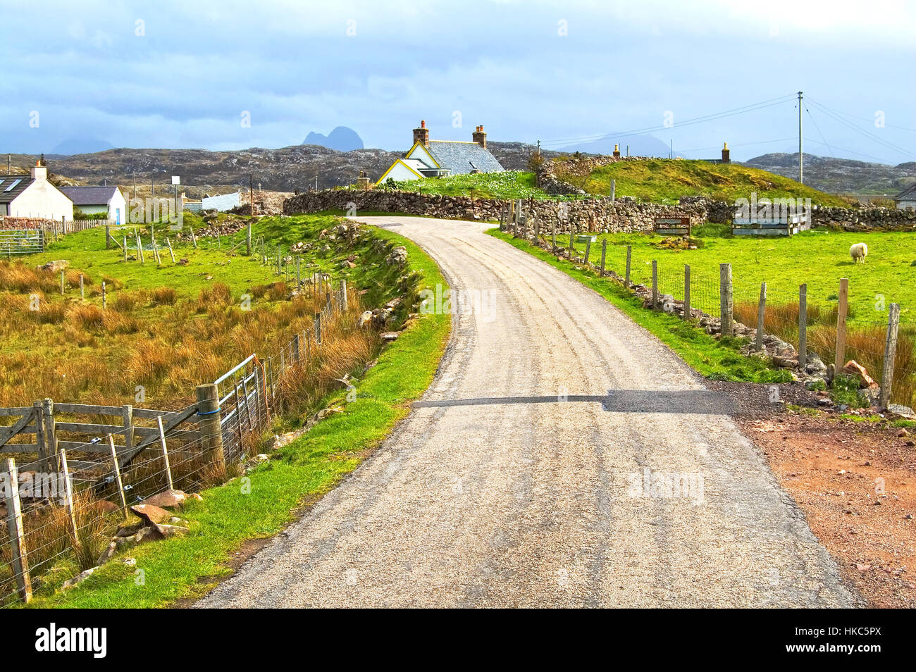 Highlands of Scotland narrow road in rural landscape. Uk, Europe. Stock Photo