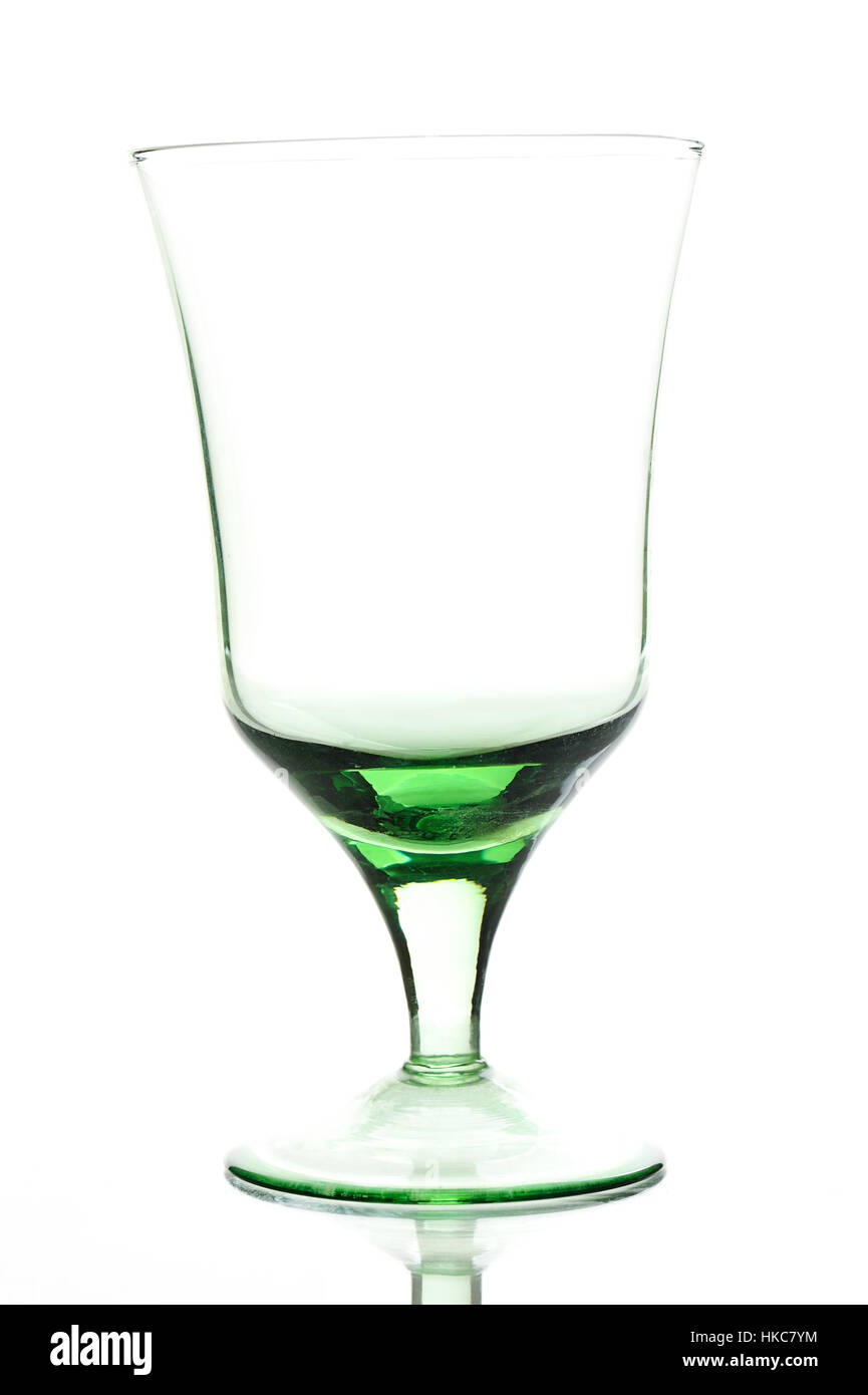 Empty glass staying on a white background Stock Photo