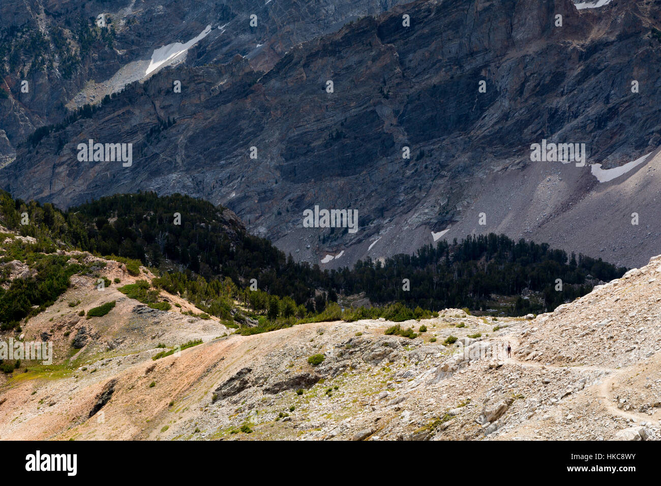 Two hikers ascending the higher elevations of the Paintbrush Canyon