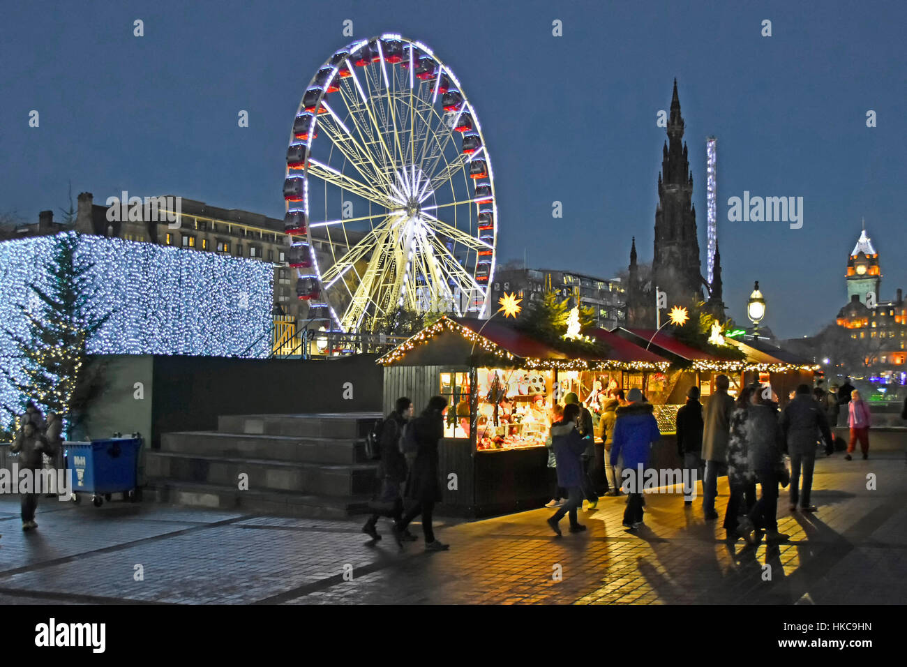 People shopping at stalls in Edinburgh European winter Christmas Market