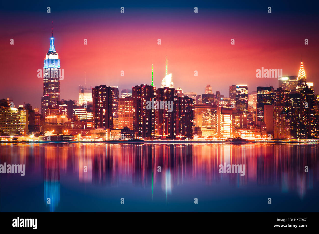 Colorful New York City skyline at night Stock Photo - Alamy