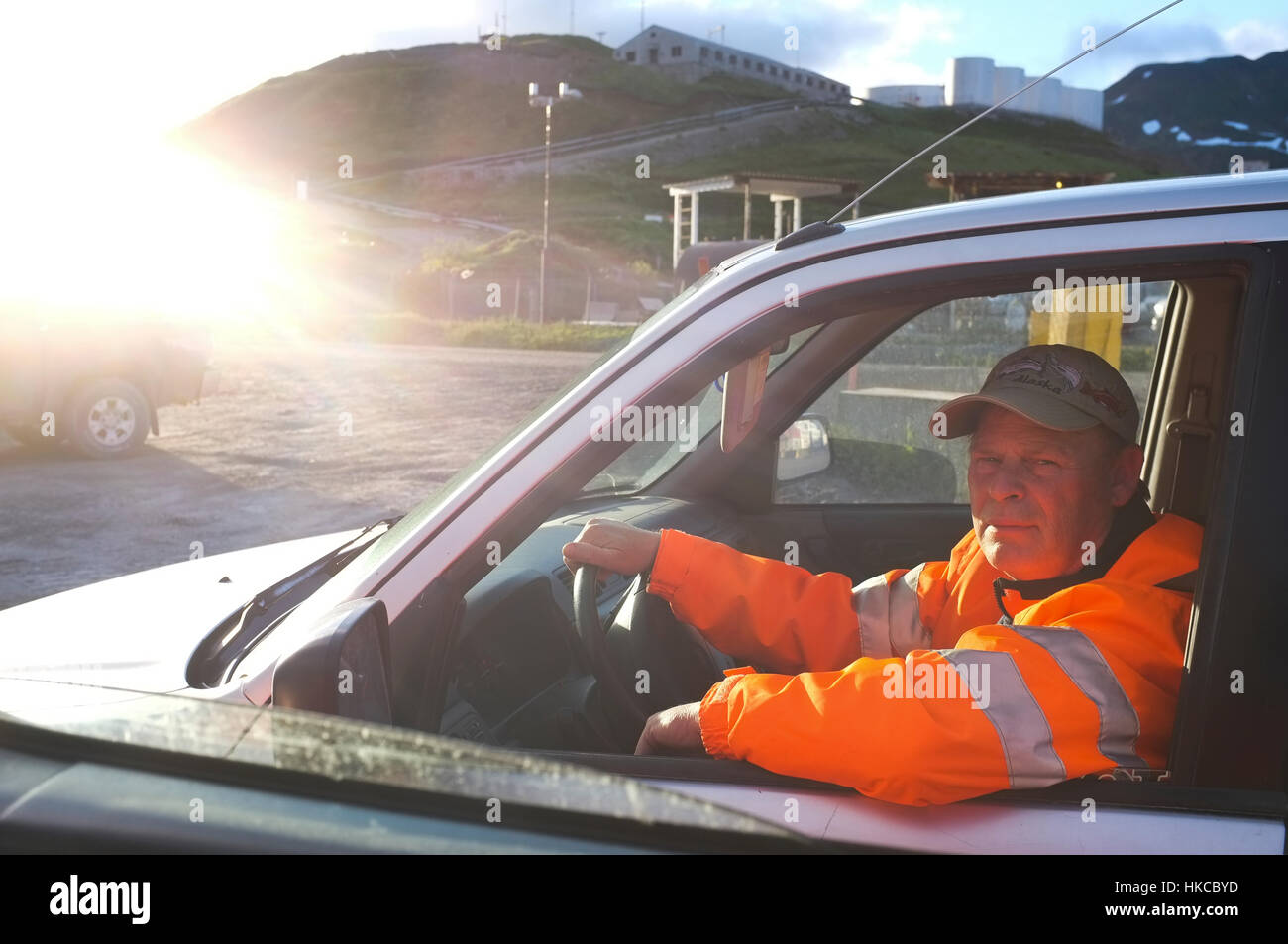 Longshoreman worker in a truck, Horizon Lines container yard, Unalaska, Southwest Alaska, USA