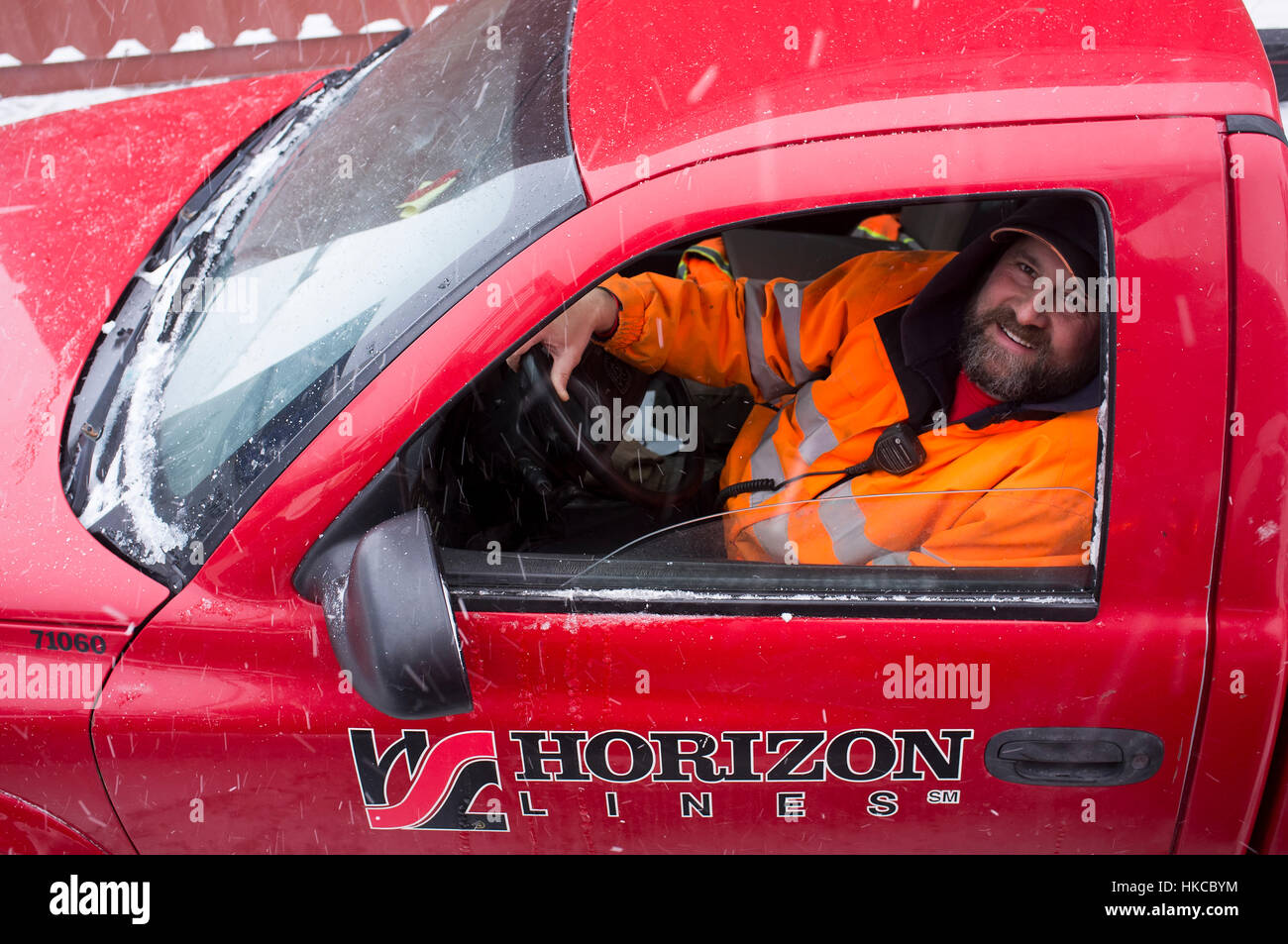 Longshoreman working in Horizon Lines container yard in Unalaska, Southwest Alaska, USA Stock
