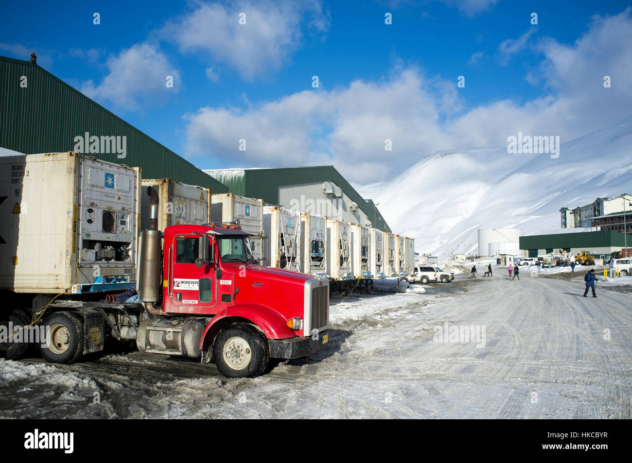 Horizon Lines truck delivering containers to the loading dock at Westward Seafoods in Unalaska, Southwest Alaska, USA Stock Photo