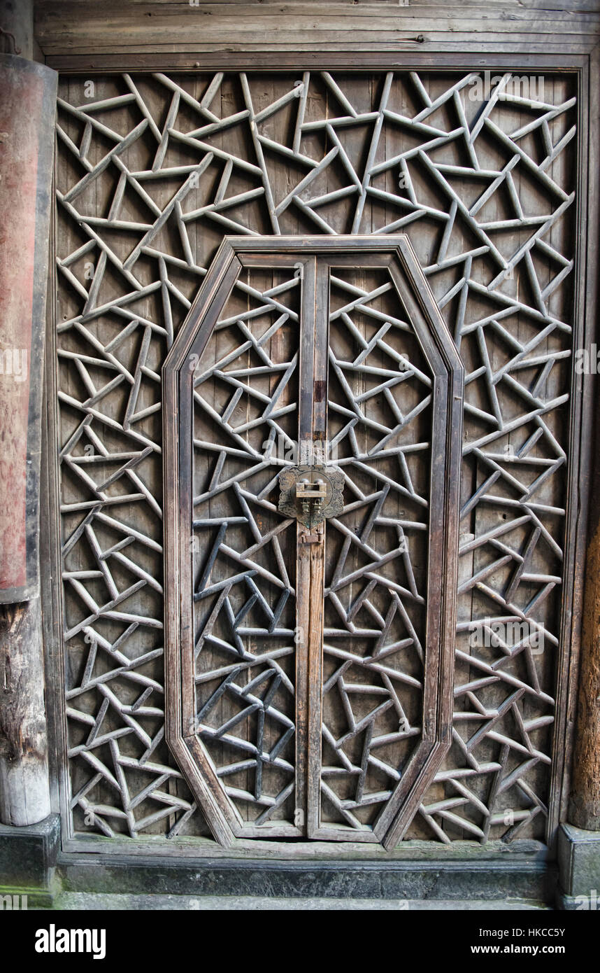 Carved wooden door in an old clan house in the ancient village of Xidi, Anhui, China Stock Photo