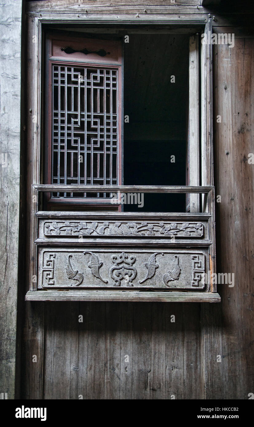 Carved window frame in an old clan house in the ancient village of Xidi, Anhui, China Stock Photo
