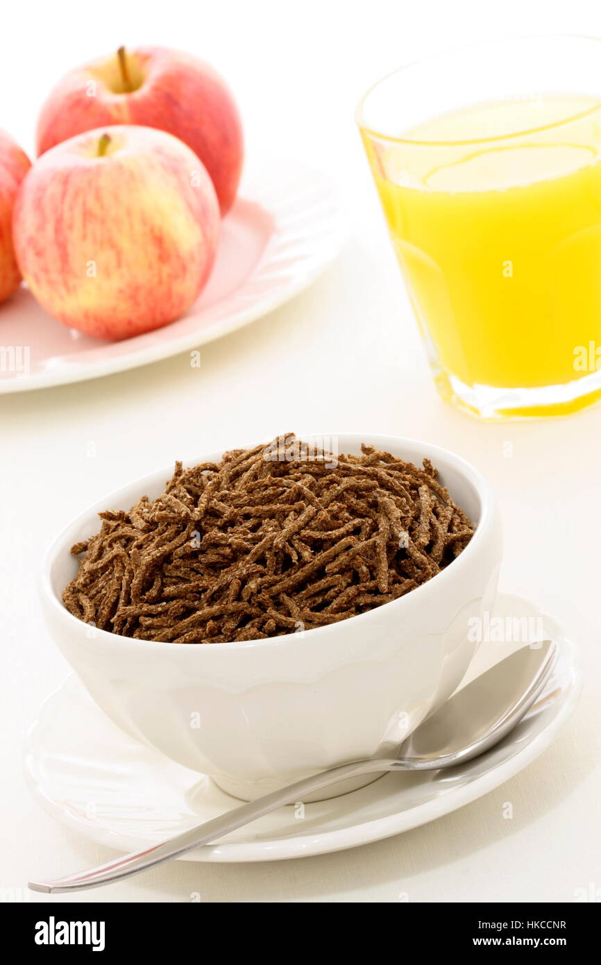 Delicious and nutritious cereal, orange juice and apple, high in bran ...