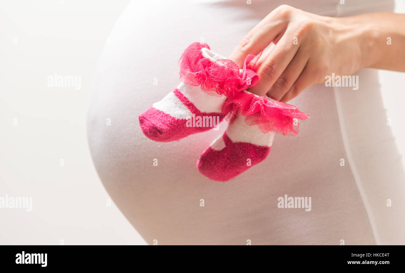 Shoes for the unborn baby Stock Photo