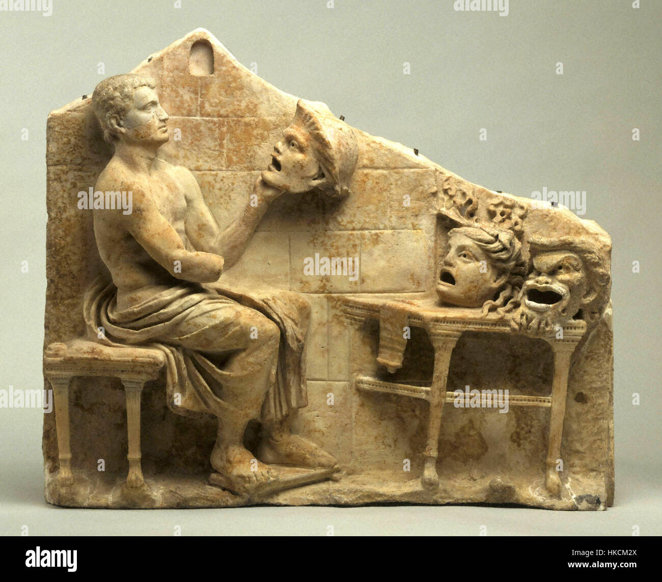 A relief depicting Menander and New Comedy masks from ancient Greek ...