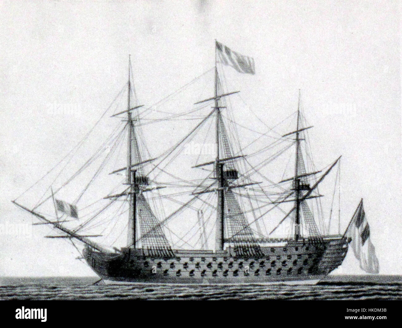 This 18th-century painting depicts a French three-decker warship, showcasing the ship's imposing structure and detailed rigging. The three-decker, a large warship with multiple gun decks, was used extensively during naval battles, particularly in the age of sail. This image captures the power and might of the French navy during the 1700s. Stock Photo