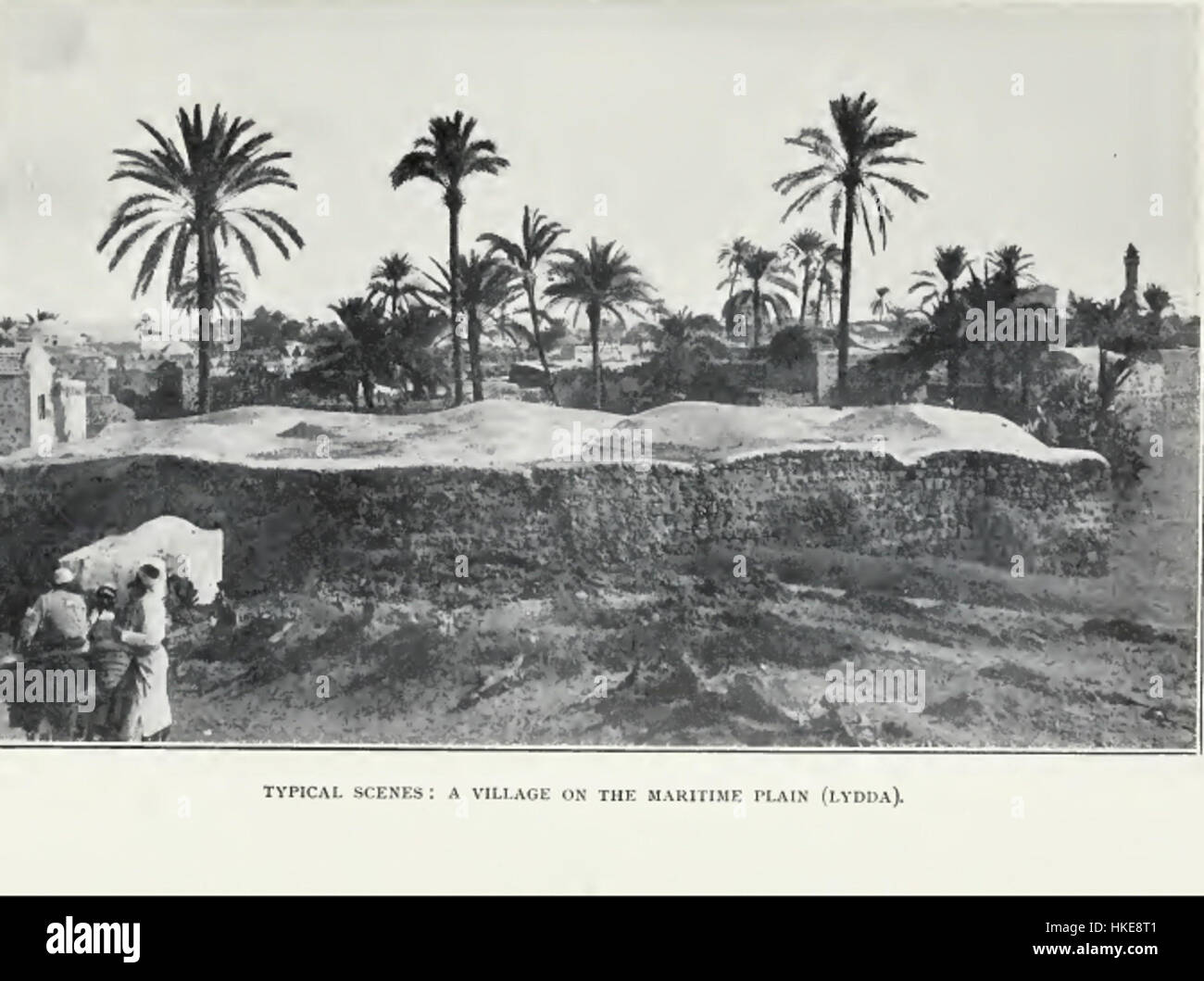 This 1903 painting titled 'Lod Lydda' depicts the town of Lod in Palestine, offering a historical view of the region at the turn of the 20th century. The painting captures the architecture and daily life of the area during this period. Stock Photo